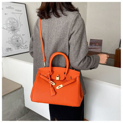 Stone Patent Orange Crossbody Bag