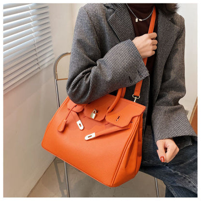 Stone Patent Orange Crossbody Bag